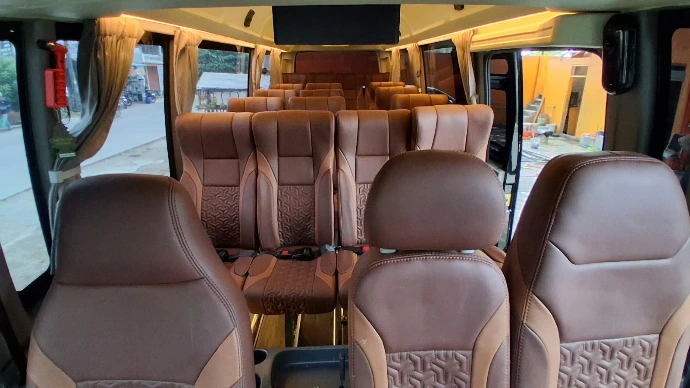 Sewa Isuzu Elf Travel